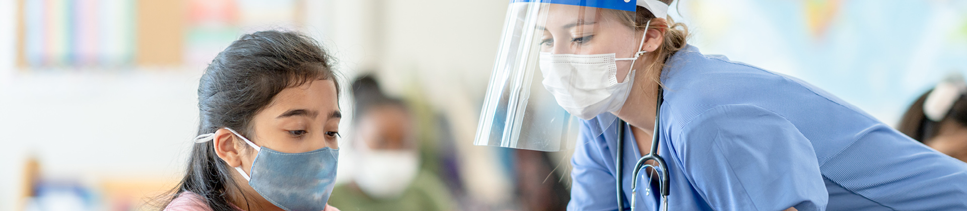 doctor checking on patient wearing masks