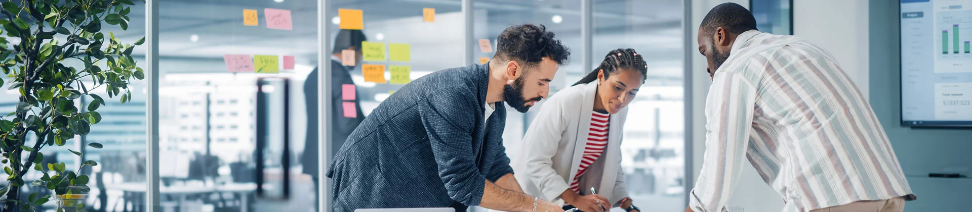 several people look at a project together