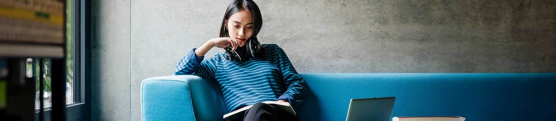 student studying on couch