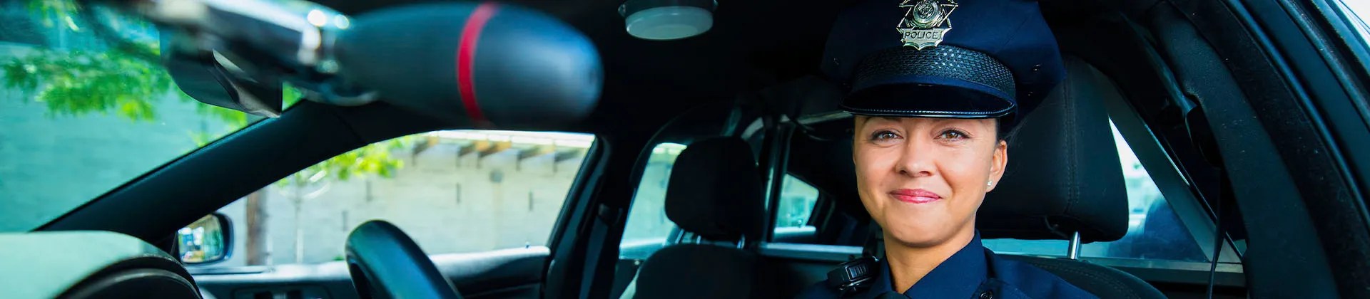 police officer sitting in police car